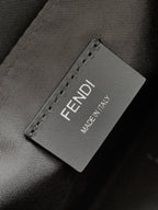 Fendi bag fabric label reading FENDI MADE IN ITALY