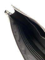 Fendi bag interior view with black lining and inner compartments