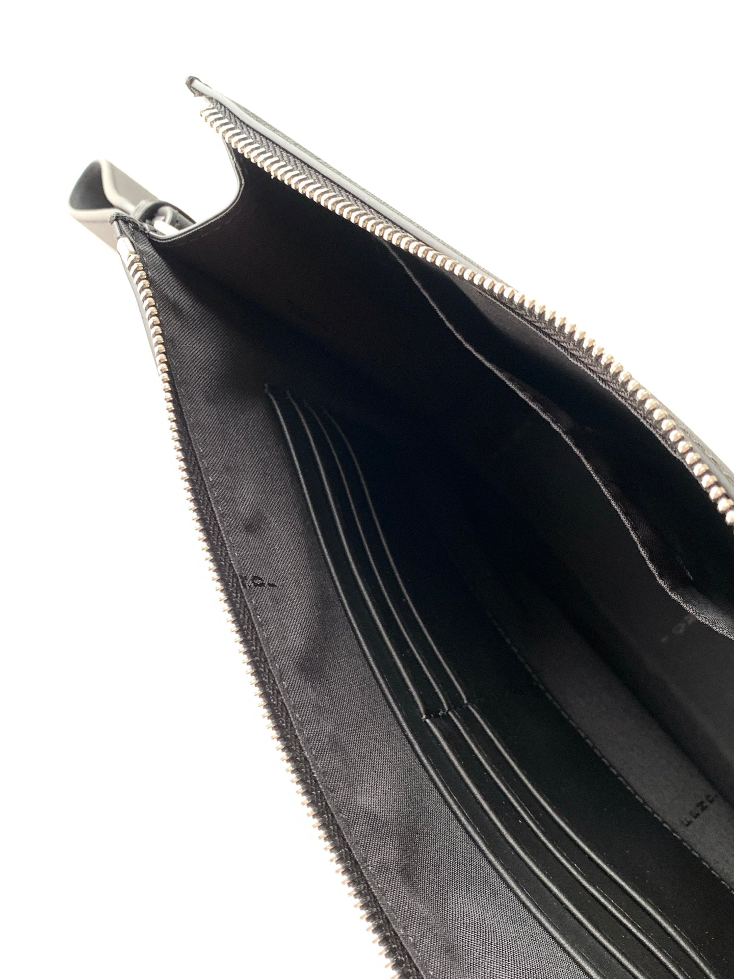 Fendi bag interior view with black lining and inner compartments