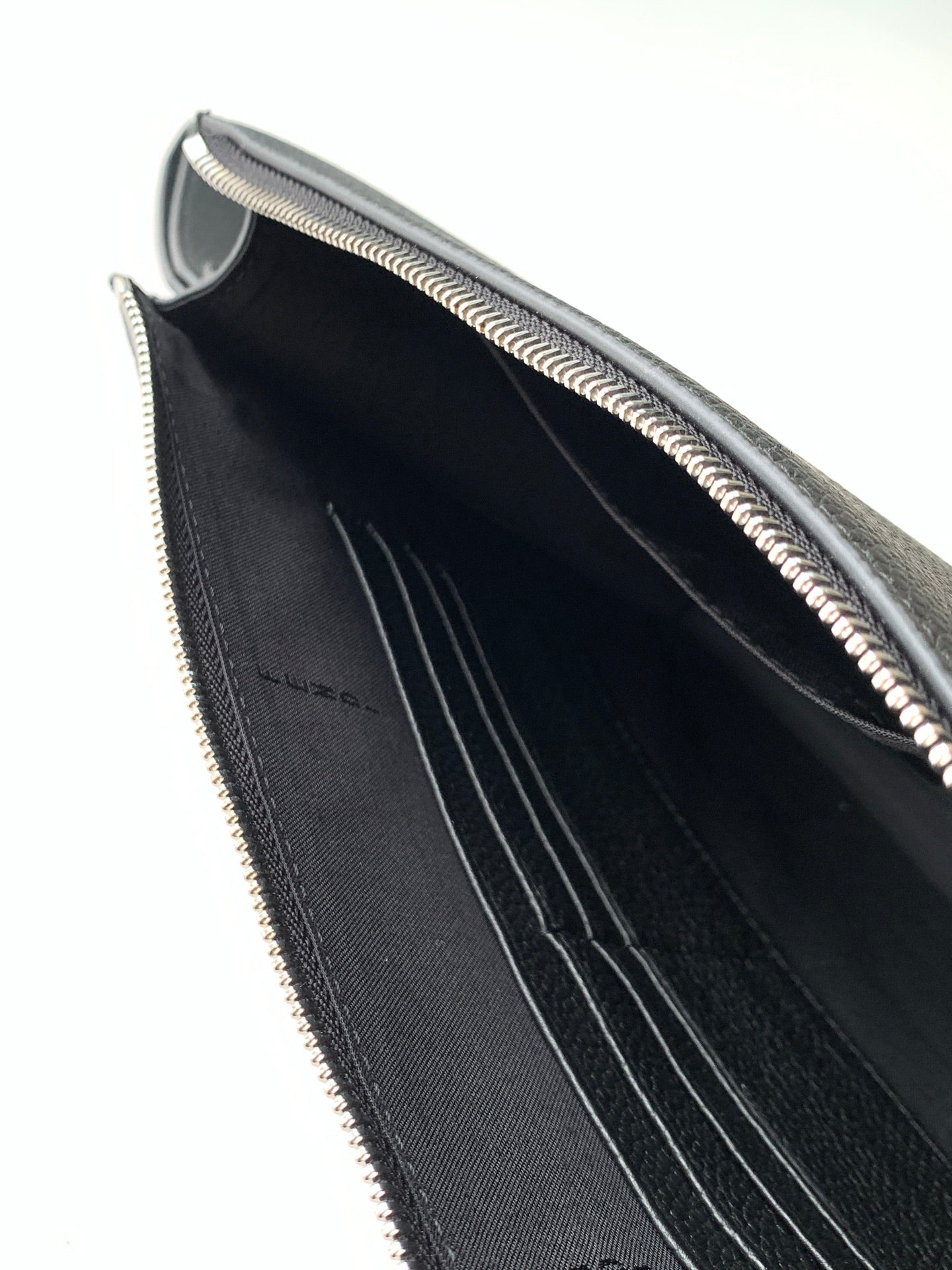 Fendi bag interior with black fabric lining and card slots