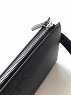 Fendi black leather bag with metal zipper and pull near top edge