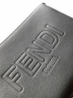 Embossed Fendi logo on textured black leather bag