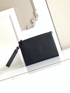 Fendi small black leather crossbody bag, embossed logo, detachable strap