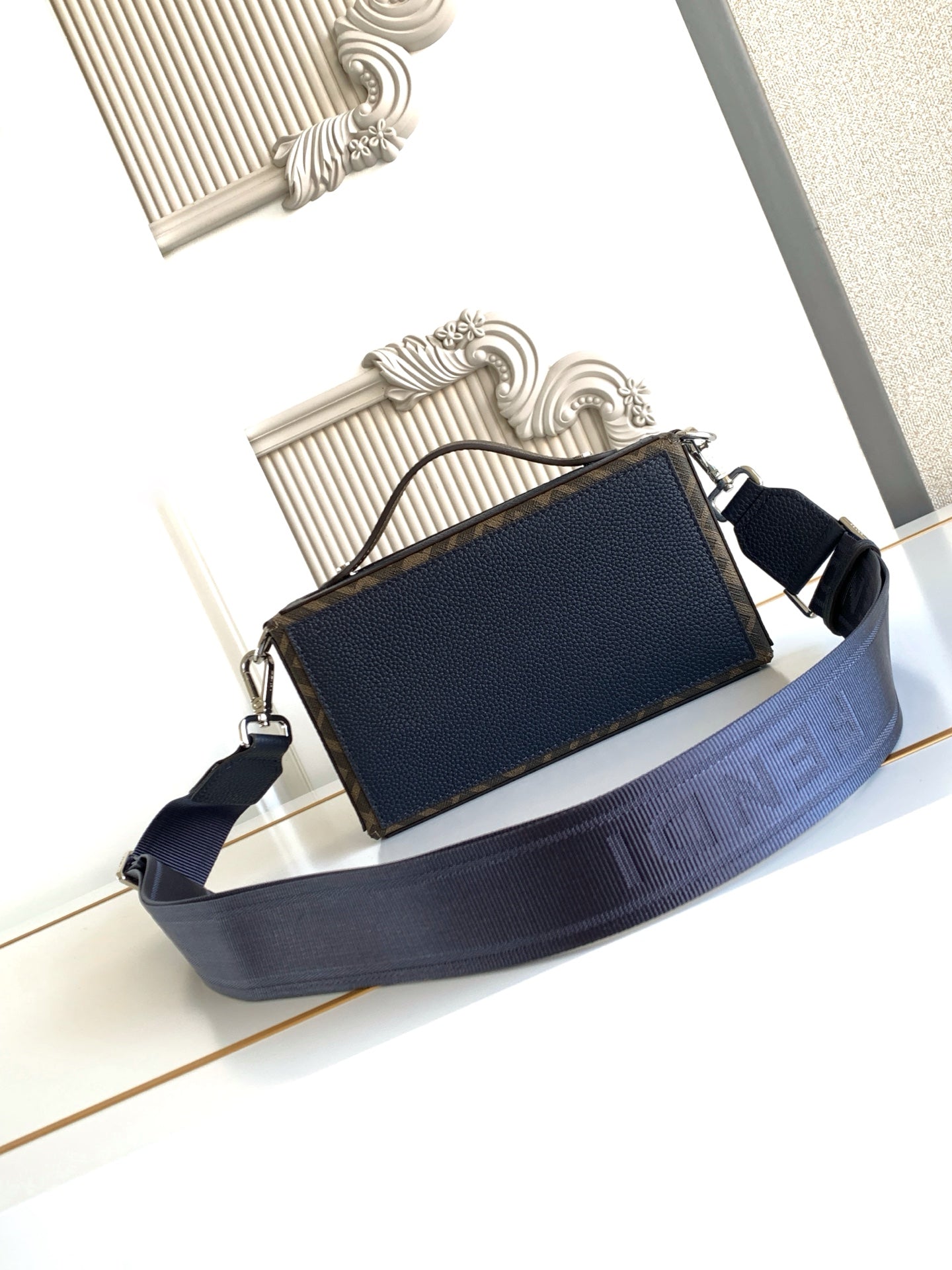 Fendi small crossbody bag, blue textured leather with rectangular front clasp and wide strap