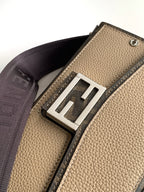 Fendi webbing strap with metal slider on textured beige mini bag