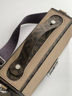 Fendi textured beige bag with navy web strap and silver strap hardware attachments