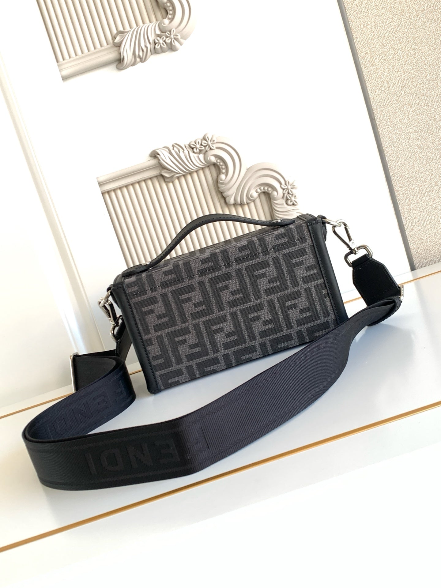 Fendi monogram crossbody bag with wide strap, black and gray patterned front