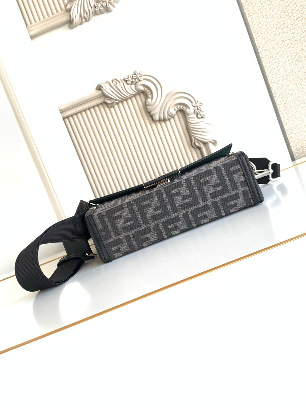 Fendi monogram crossbody bag with long strap, black and gray logo pattern