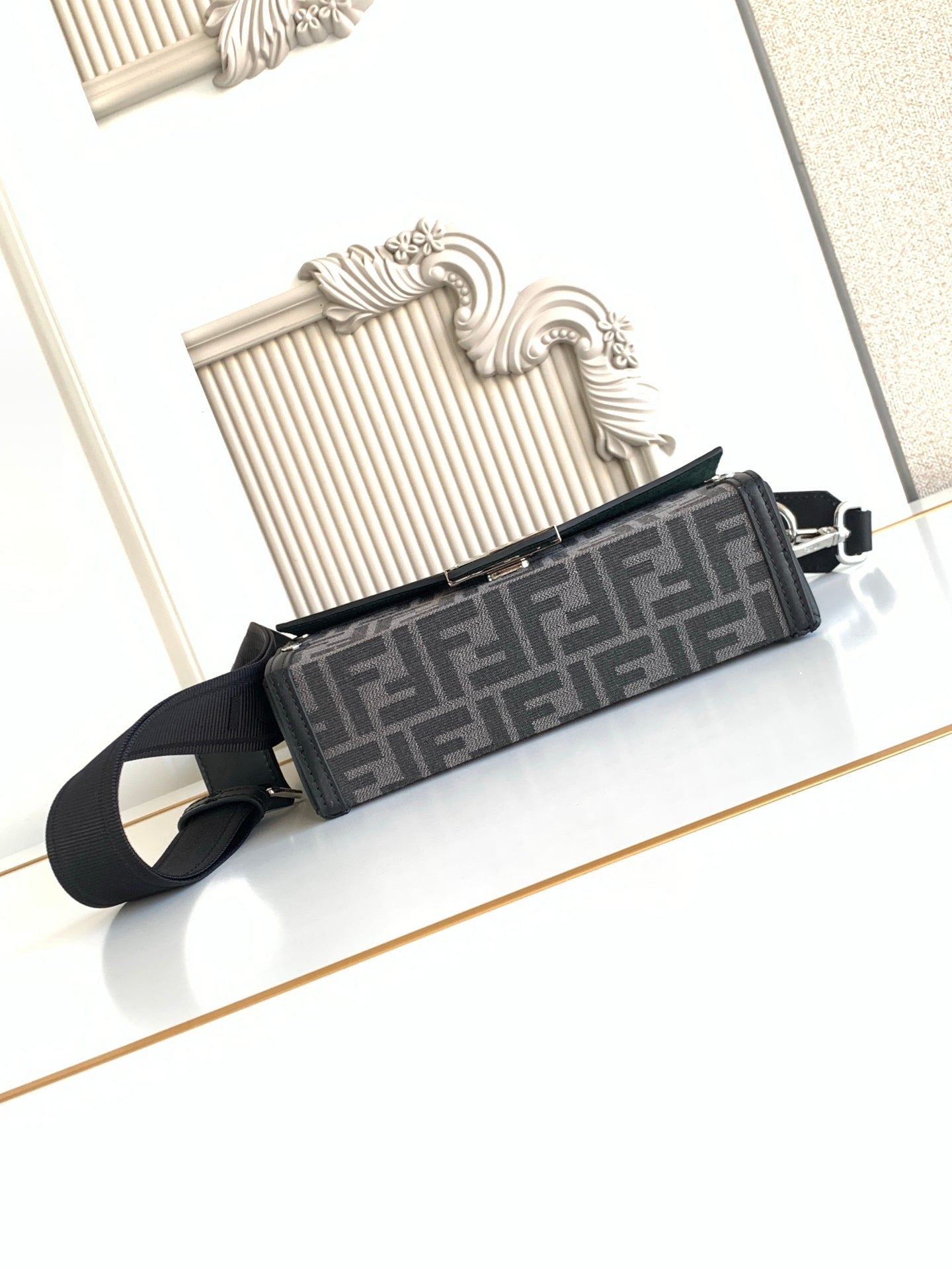 Fendi monogram crossbody bag with long strap, black and gray logo pattern