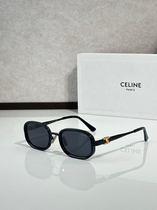 Black and gold sunglasses with dark tinted lenses, front view