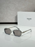 Silver and gray sunglasses with dark tinted lenses, round-square shape