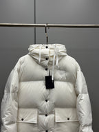 White hooded puffer jacket with buttoned front and flap patch pockets