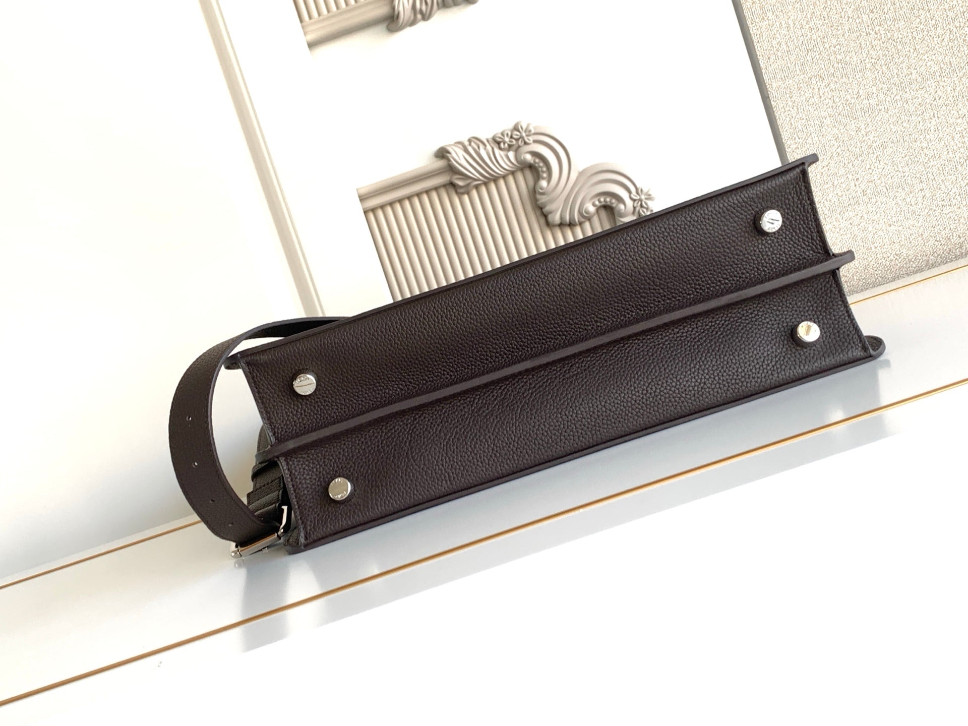Fendi dark leather bag strap with metal studs and shoulder handle