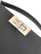 Textured black bag strap with gold-tone buckle and centered Fendi logo plate.