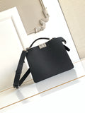 Black leather shoulder bag with gold-tone logo plaque and adjustable strap