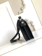 Black leather shoulder bag with strap and front snap-flap pocket