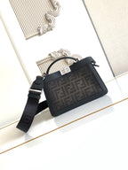 Black Fendi crossbody bag with top zip, FF logo jacquard panel, shoulder strap