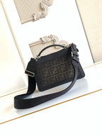 Black Fendi crossbody bag with adjustable web shoulder strap and gold-tone hardware