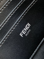 Fendi ROMA logo on black textured bag panel with contrast stitching