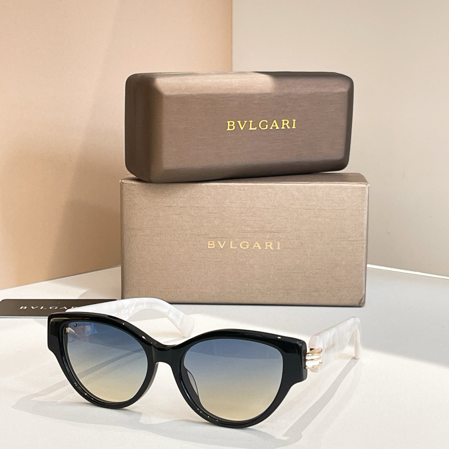 Bvlgari sunglasses, black frame with light blue tinted lenses