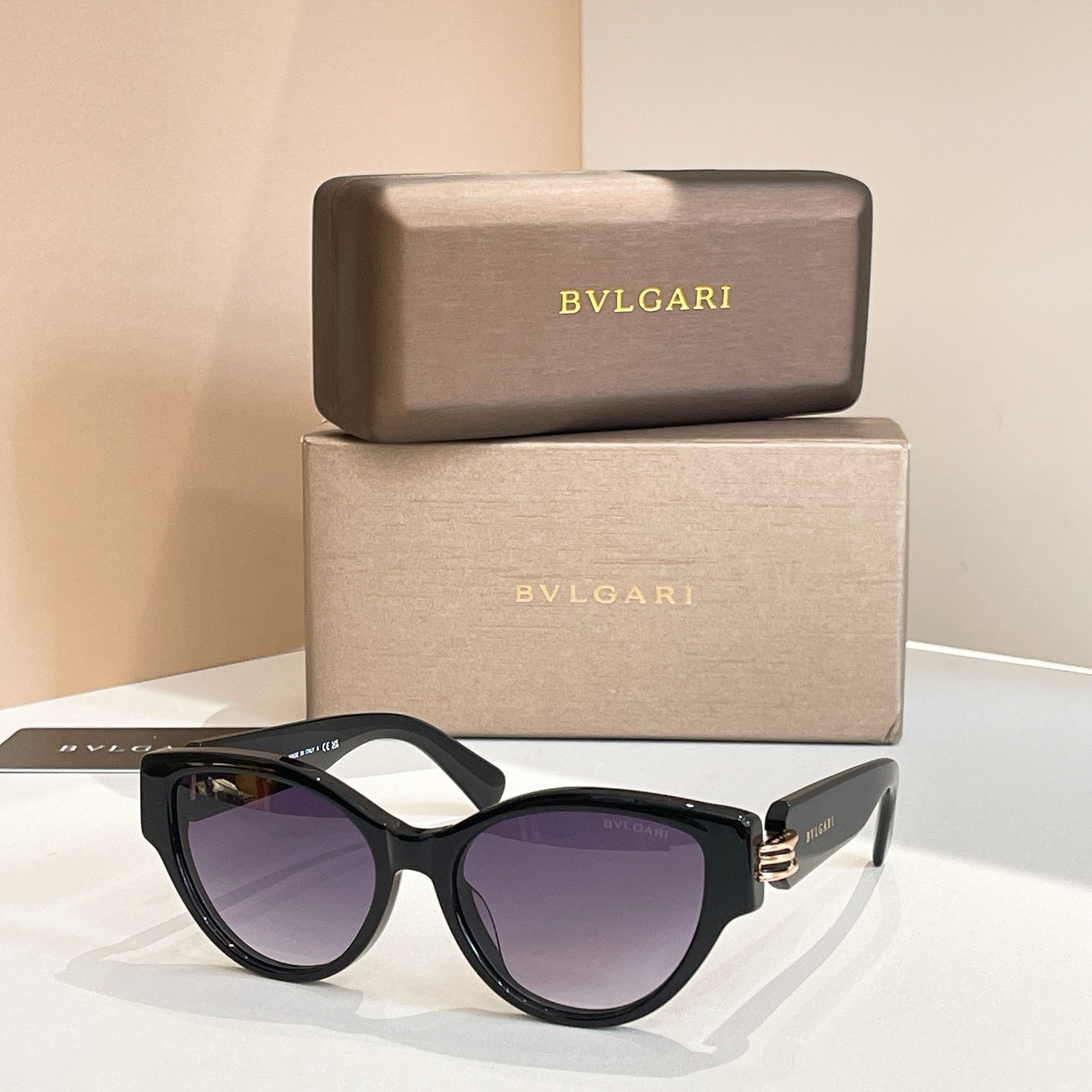 Bvlgari sunglasses, black frame with dark purple tinted lenses