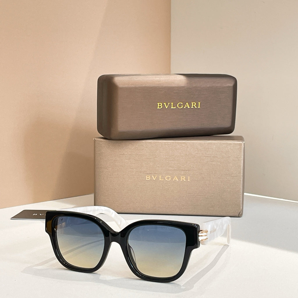 Black sunglasses with blue-tinted lenses and thick frames, metal hinge detail.