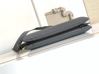 Fendi dark gray leather bag side view with long zipper and adjustable strap