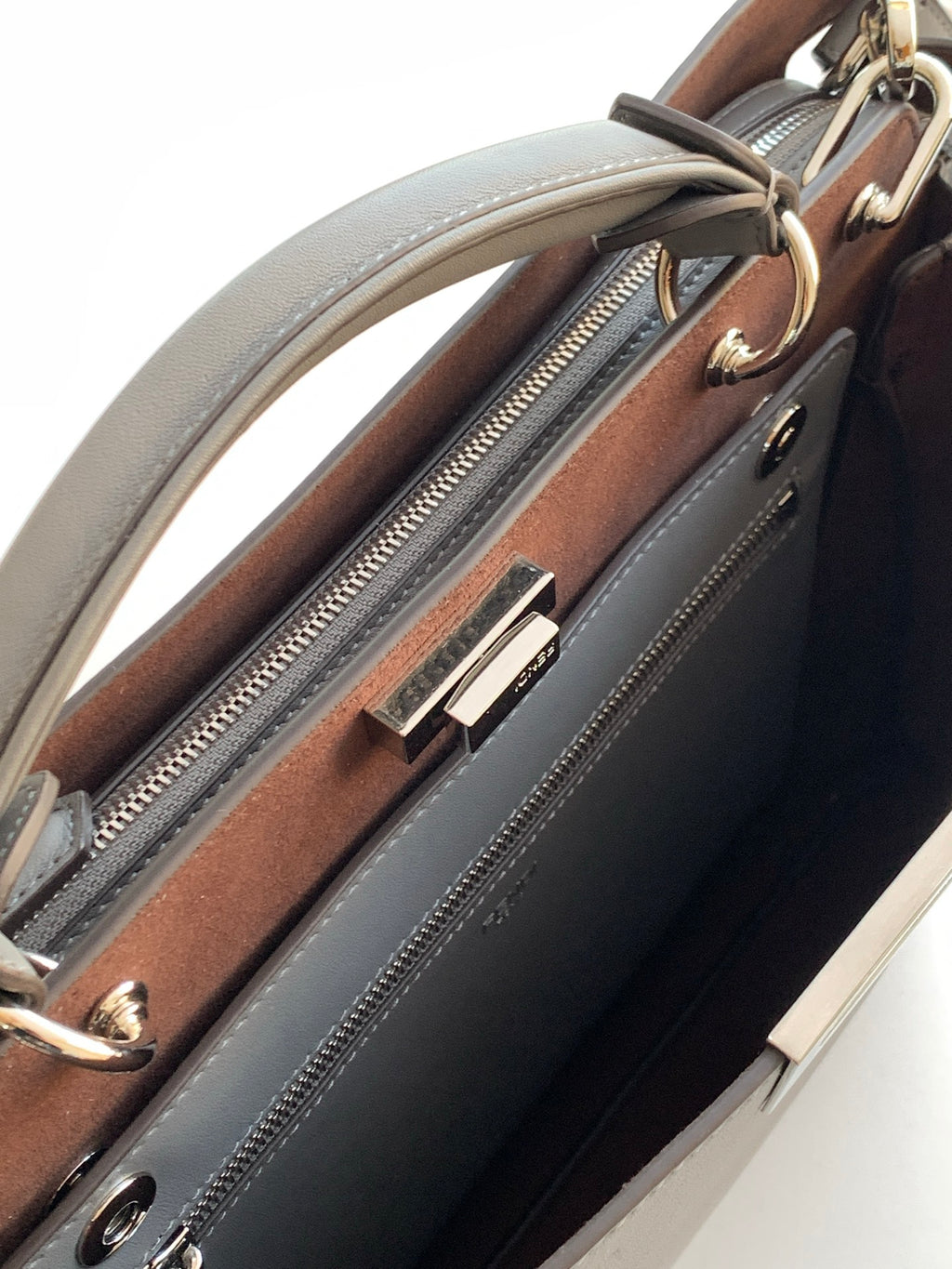 Fendi bag interior with brown lining and zip pocket