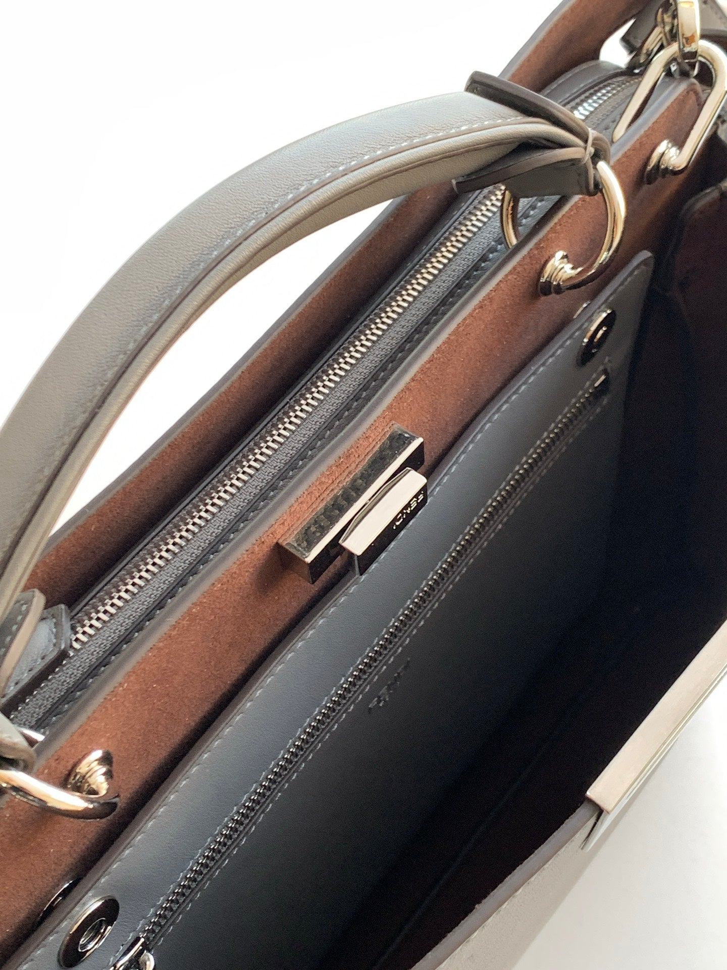 Fendi bag interior with brown lining and zip pocket