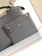 Fendi dark gray leather bag with front zip pocket and Fendi logo detail