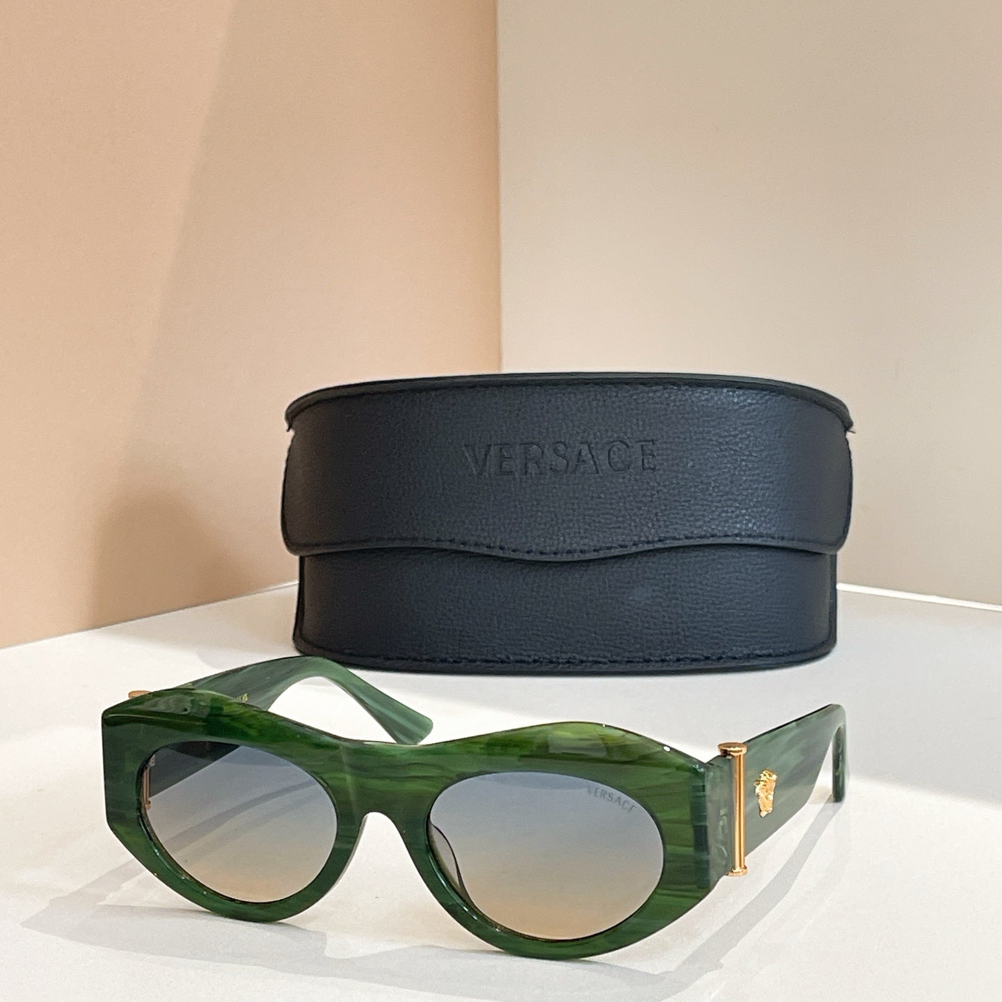 Versace sunglasses, green round frames with light lenses and gold emblem hinge