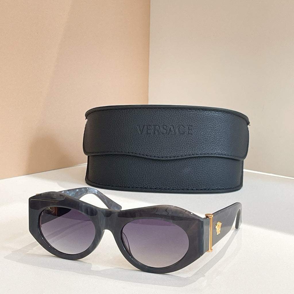 Versace sunglasses, dark gray round frames with purple-tinted lenses and gold hinge
