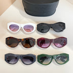 Six Versace sunglasses with assorted frames and lenses, beside black case