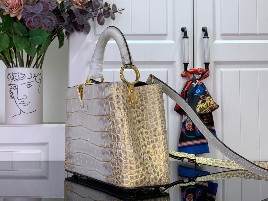 Louis Vuitton handbag with gold-tone ring handle, croc-embossed white body