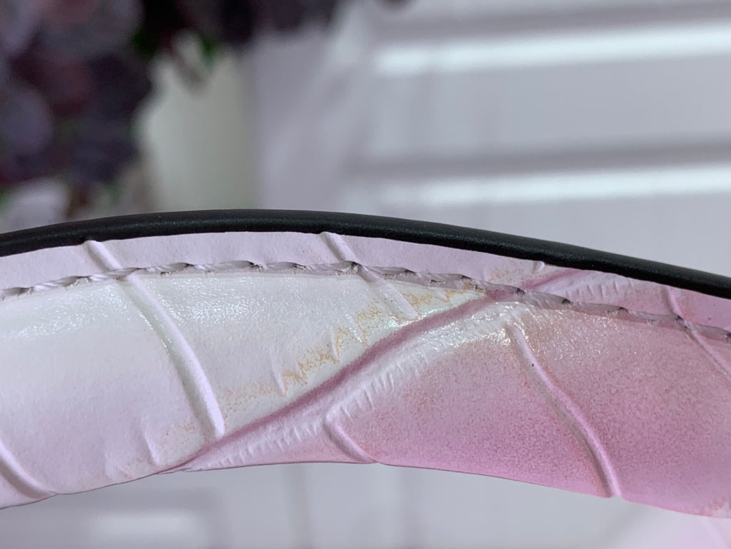 Louis Vuitton croc-embossed leather with pink ombre lining detail.