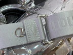 Silver Louis Vuitton handbag with gray jacquard strap and metal buckle hardware