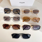Assorted sunglasses laid out in rows, featuring various frames and tinted lenses