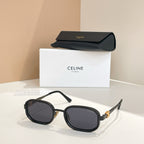 Square sunglasses with black frames and tinted dark lenses, temple arms visible