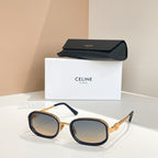 Square sunglasses with dark frames and tinted lenses, temple arms visible