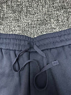 Dior pants, slate blue elastic waistband with front drawstring and looped ties