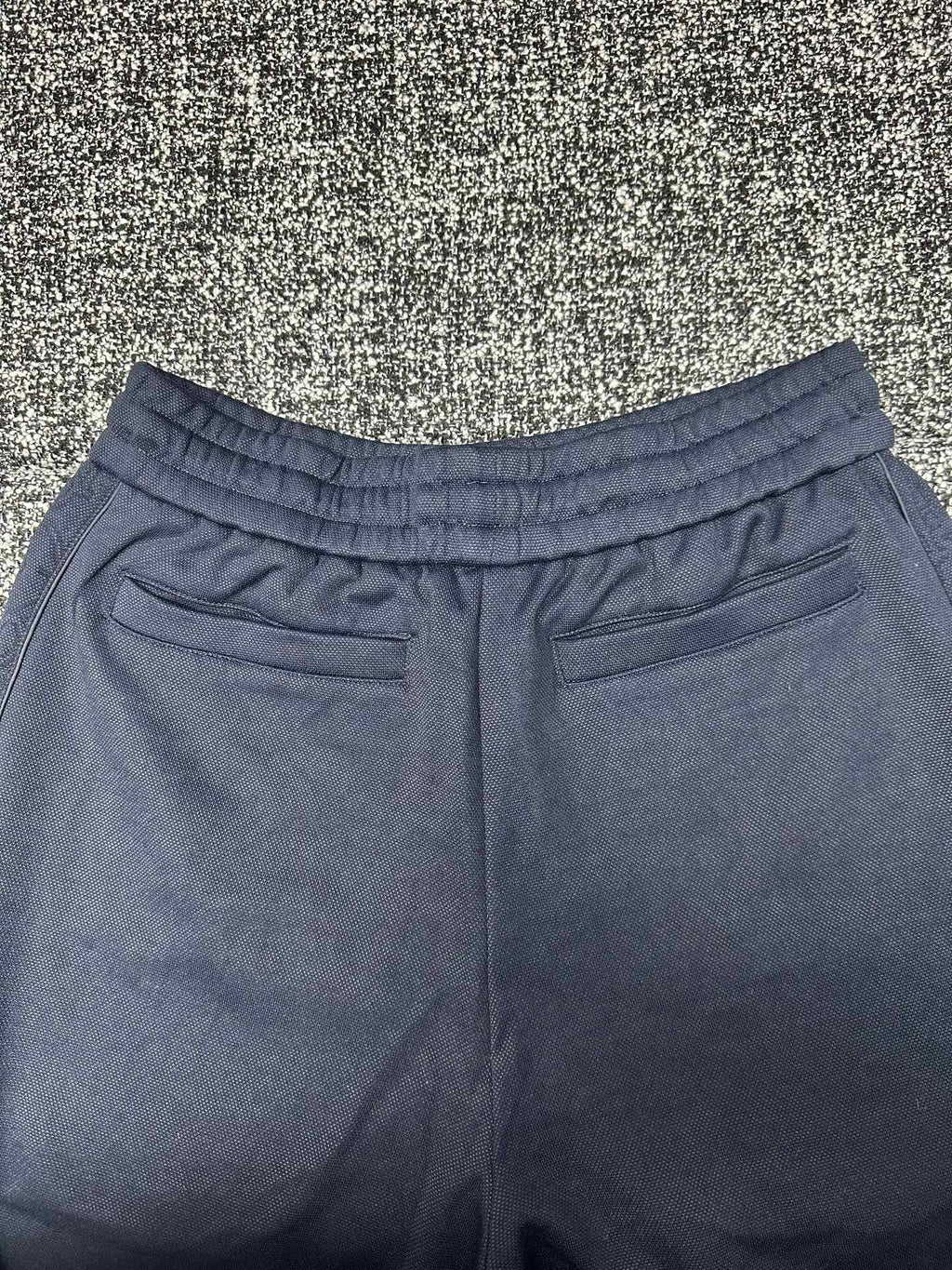 Dior pants, slate blue with elastic waist and patch pockets at the hips