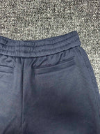 Dior pants, slate blue wide-leg with pleated waistband and hip patch pockets