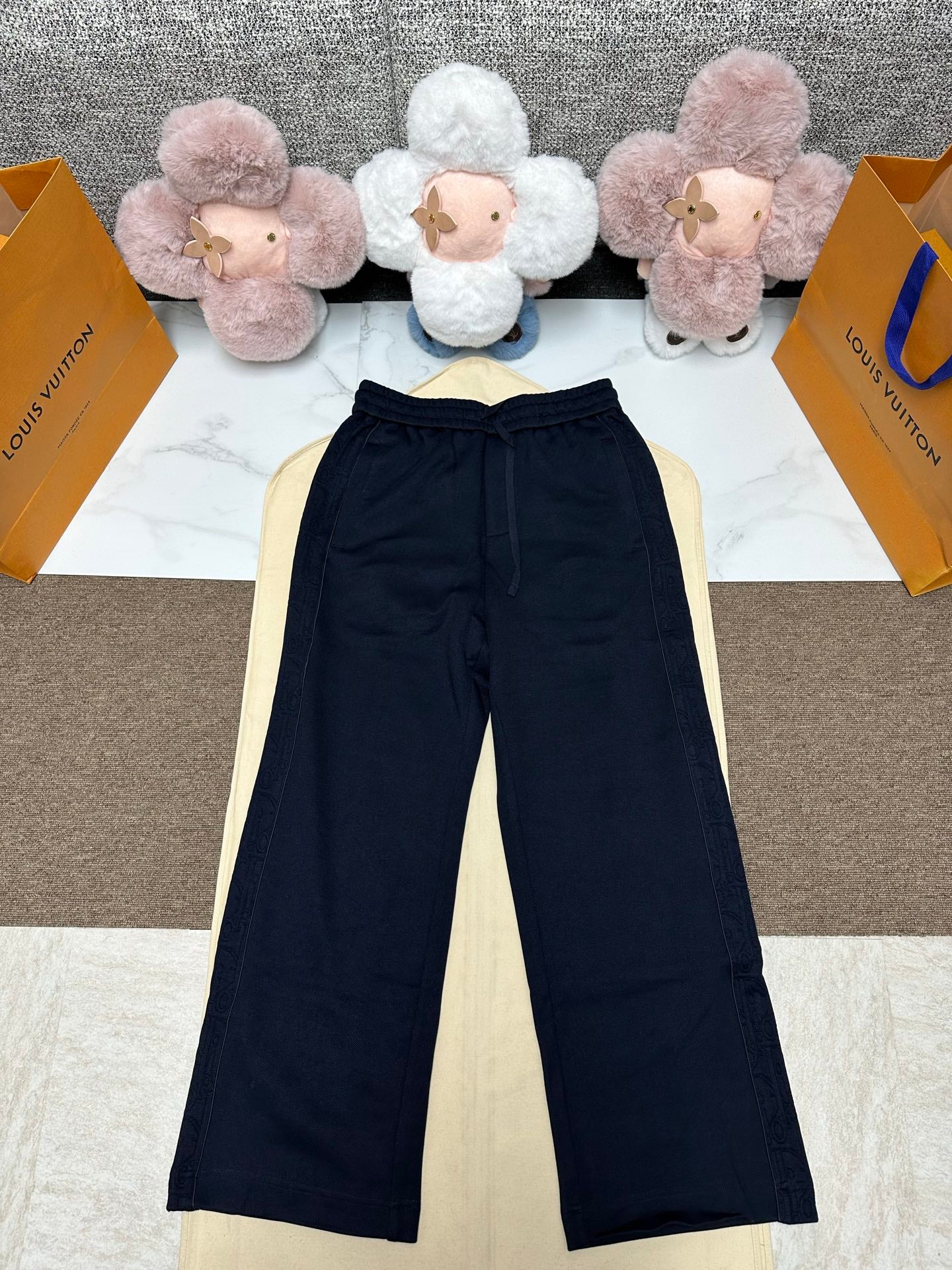 Dior pants, dark navy wide-leg with elastic waistband and drawstring ties