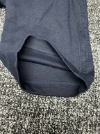 Dior pants cuff and hem detail, slate blue fabric with stitched finish