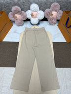 Beige wide-leg pants with elastic waist and front seam detail