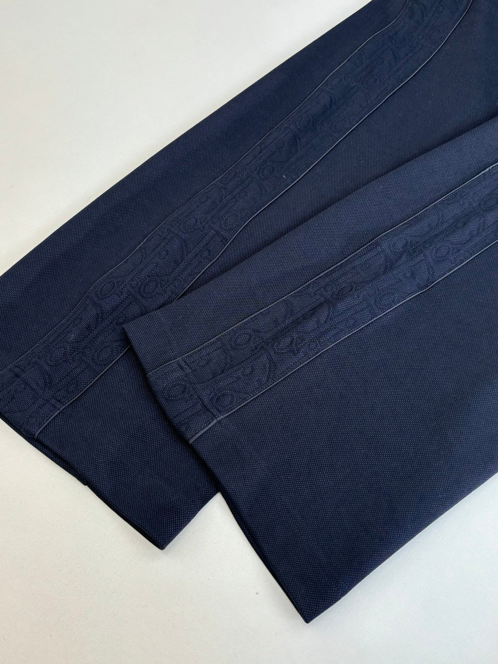 Navy pants with tonal jacquard texture and straight leg panels