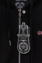 Black zip hoodie central zipper area with ornate graphic patch