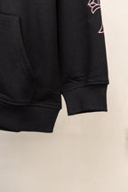 Black long-sleeve zip hoodie hem and ribbed sleeve cuff