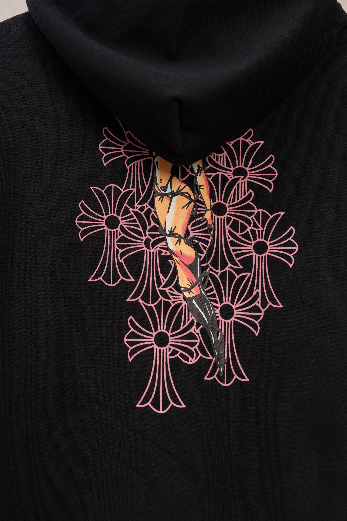 Black long-sleeve zip hoodie with large back graphic and hood
