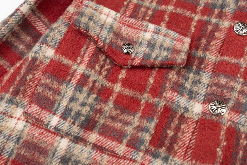 Red plaid shirt jacket with chest pocket flaps and small round buttons